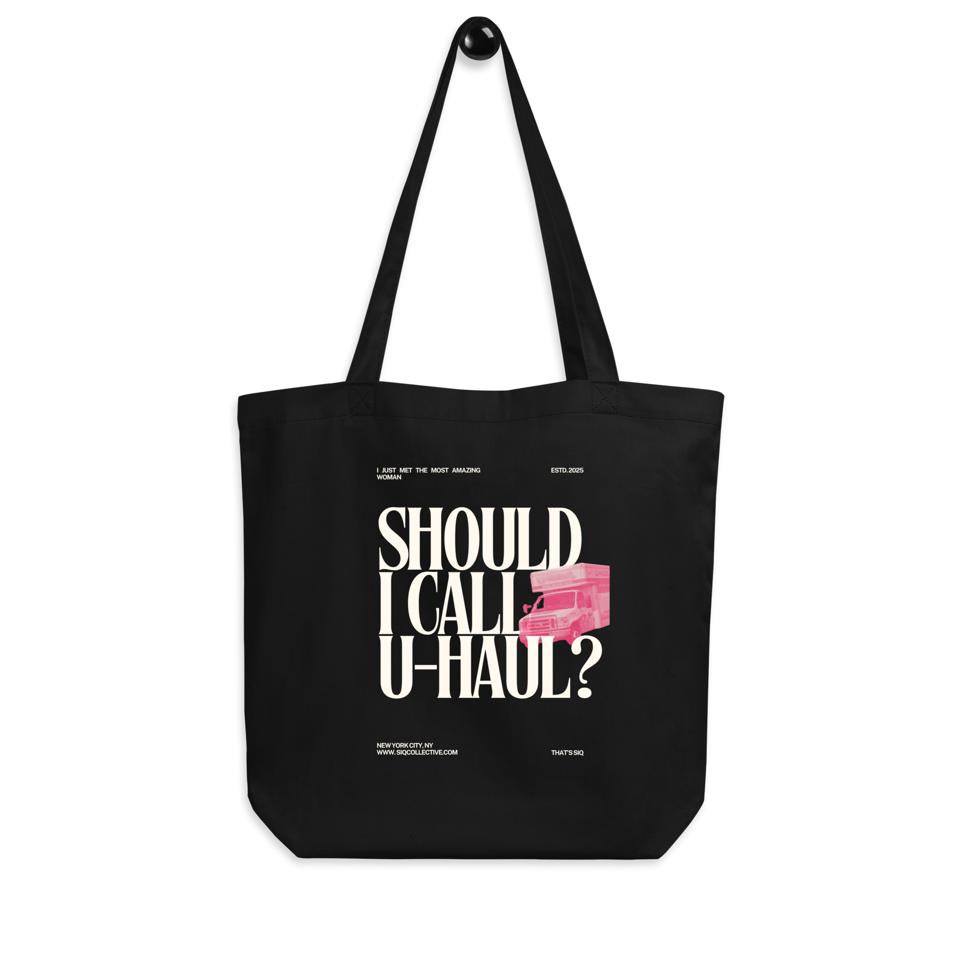 Black tote bag with white text and pink truck graphic featuring Should I Call UHaul Organic Tote design