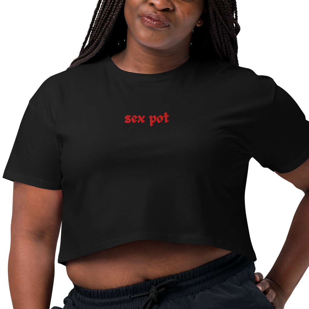Black cropped t-shirt with red sex pot text worn by woman The Sex Pot Crop Top Tee by The Siq Collective