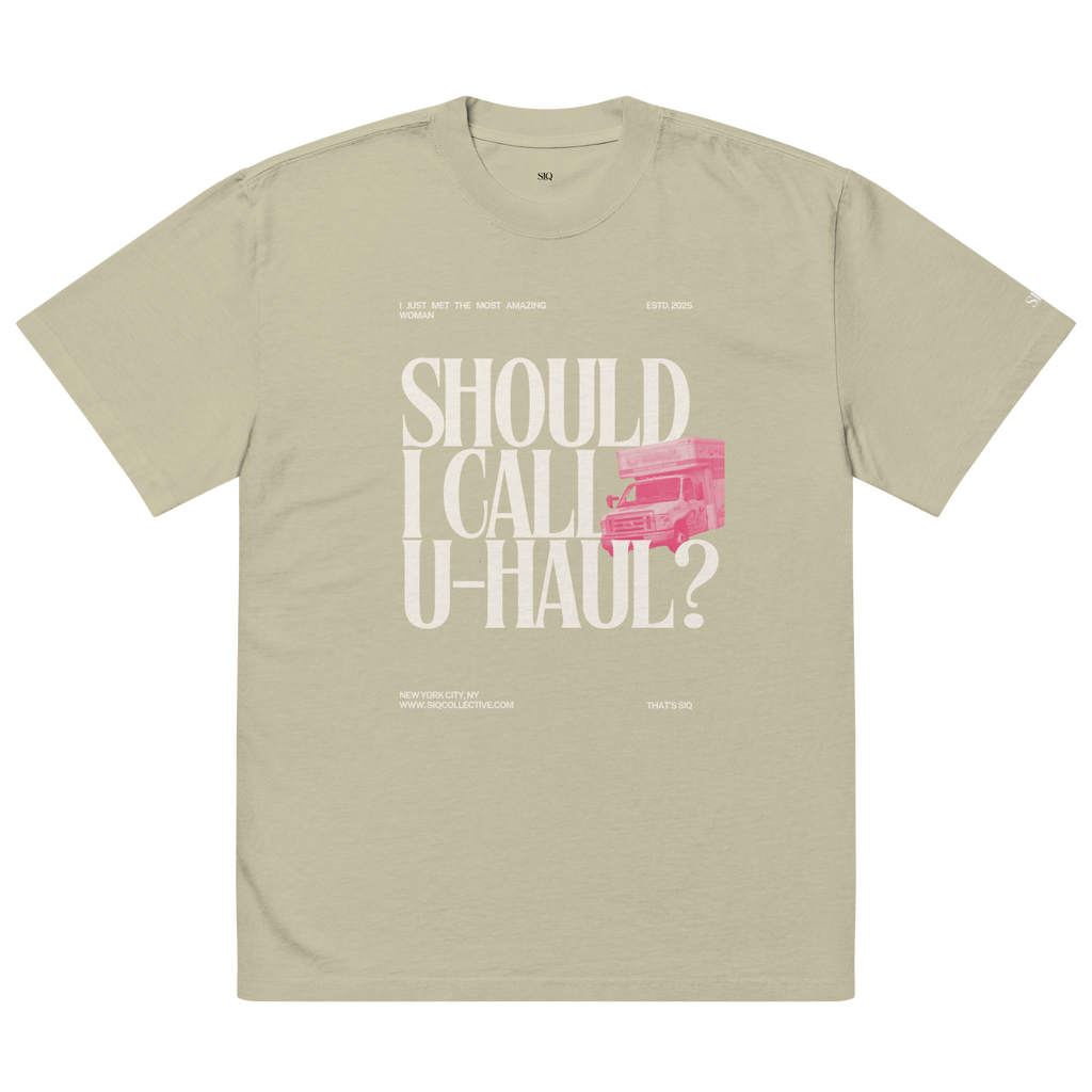 Beige Call UHaul graphic t-shirt from The Siq Collective with bold white text and pink truck design
