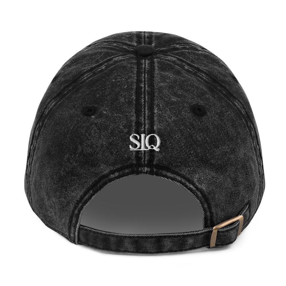 Back view of black good girl embroidered denim hat with adjustable strap by The Siq Collective