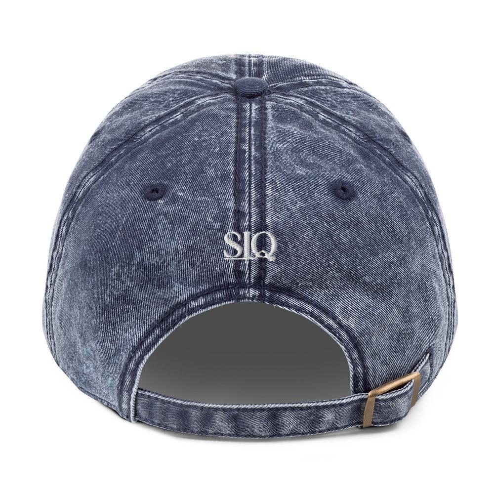 Back view of good girl embroidered denim hat by The Siq Collective with adjustable strap and metal buckle