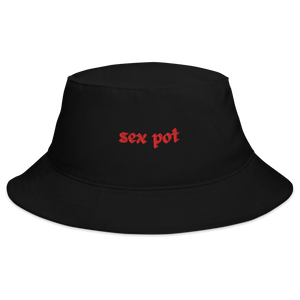 The Sex Pot Bucket Hat in Onyx black with red embroidered text from The Siq Collective flat lay