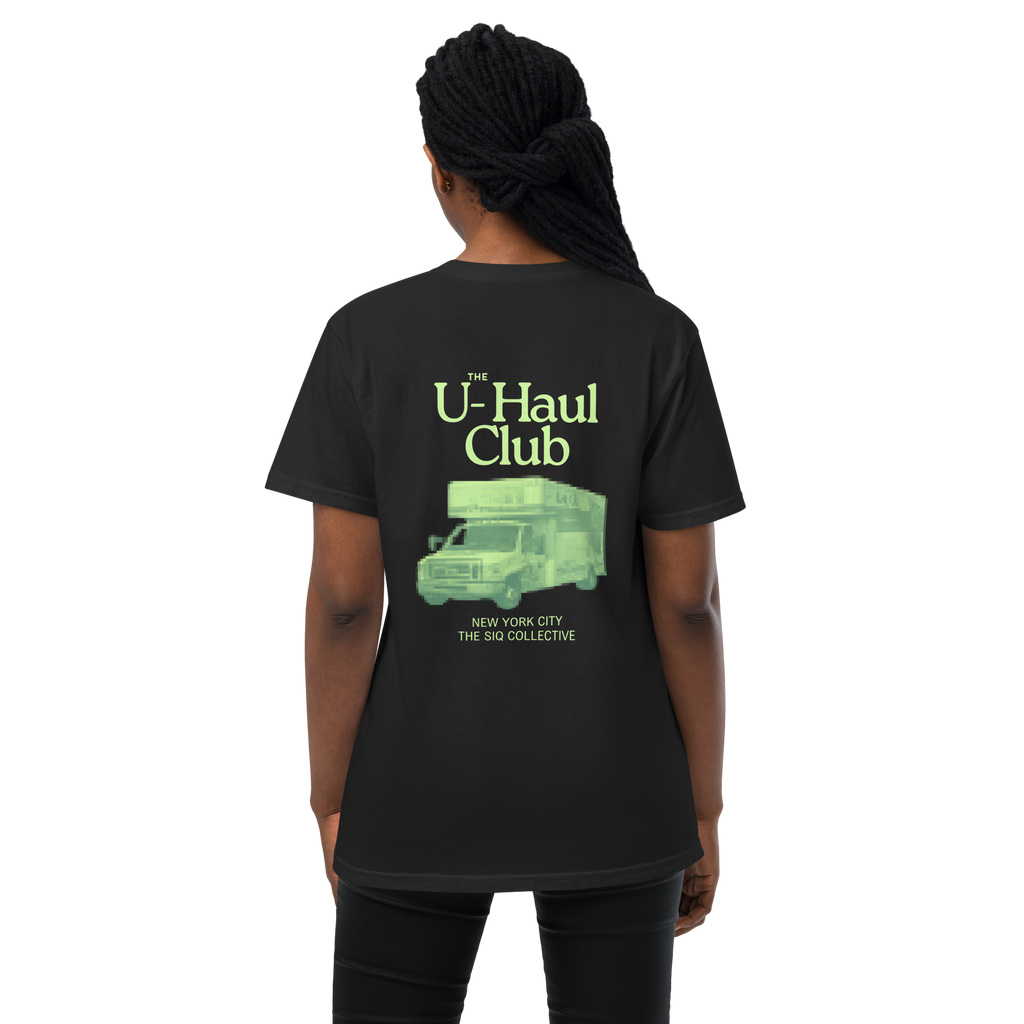UHauler's Club Comfort Tee black shirt with light green U-Haul truck graphic on back by The Siq Collective