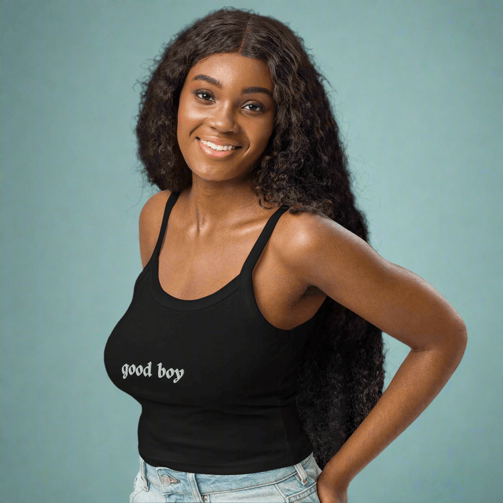 Woman wearing Good Boy Baby Tank in After Midnight by The Siq Collective in black with white text